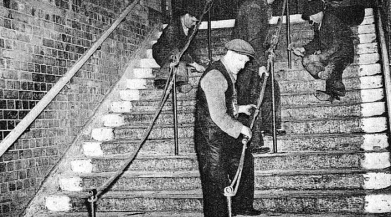 Archive photo of workers repairing stairs, Bethnal Green tube disaster.