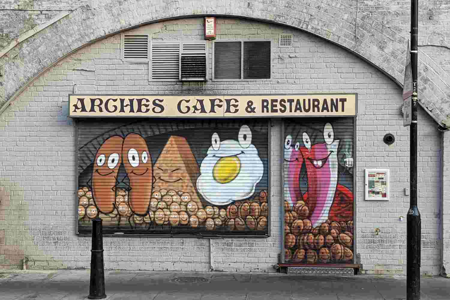 The shutter at Arches Cafe, decorated with breakfast items
