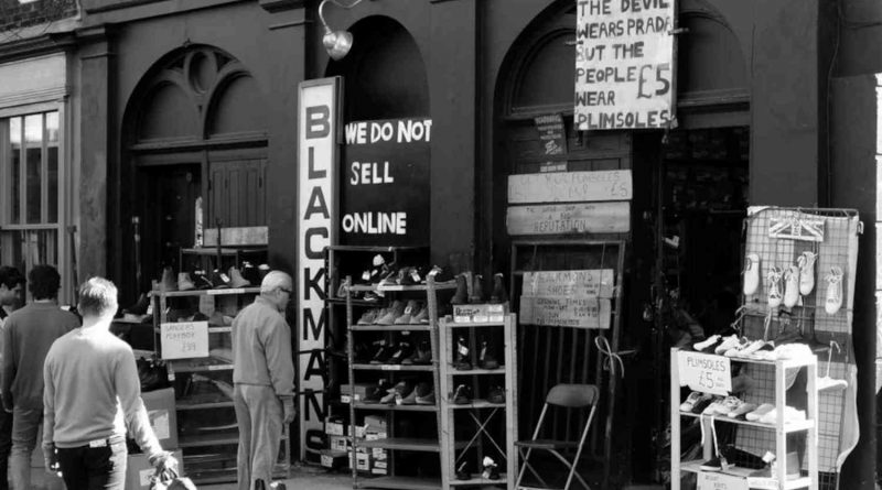 Customers browsing the front of Blackman's Shoes, Cheshire Street