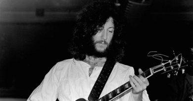 Peter Green, born in Bethnal Green, plays the guitar on stage