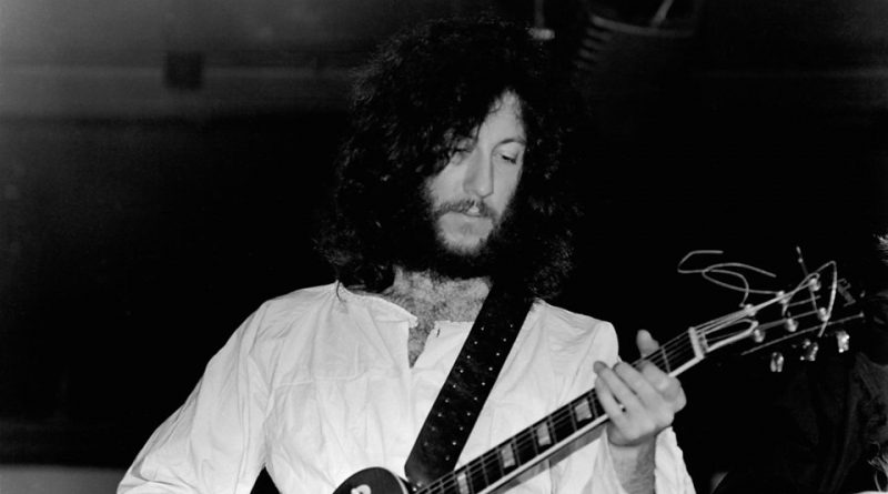 Peter Green, born in Bethnal Green, plays the guitar on stage