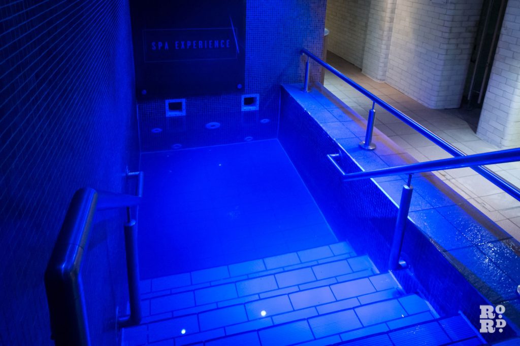 Blue plunge pool in York Hall Turkish Baths, Bethnal Green, East London.