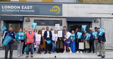 LEAP workers picketing outside the Bethnal Green school, with signs that say "Defend Education."